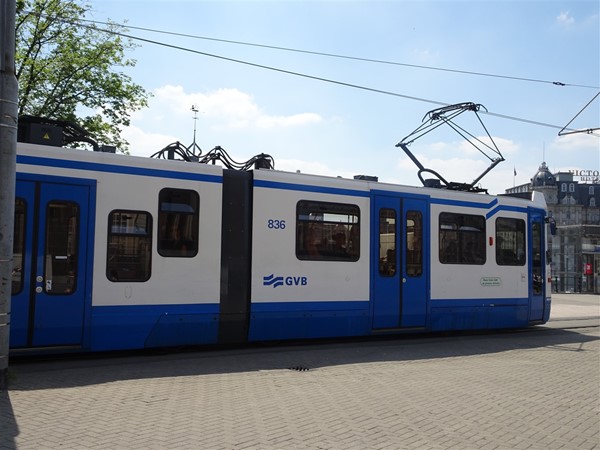 Older-style Amsterdam tram. The wheelchair accessible doors are the ones on the left of the picture.