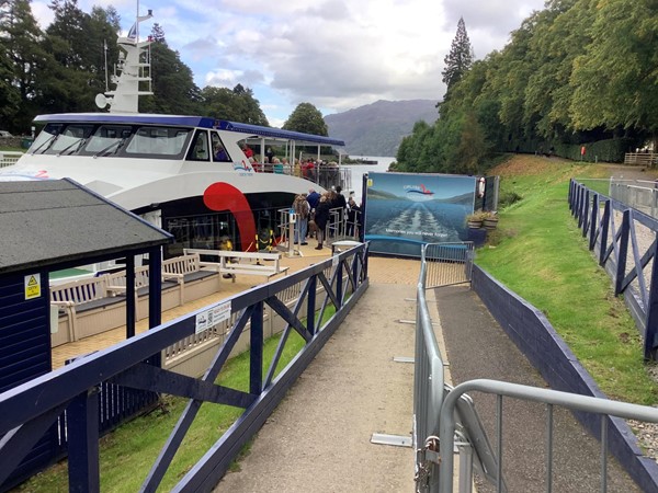 Image of a ramp going to a boat on the canal