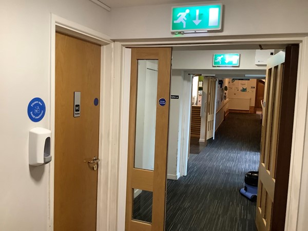 Image of hotel bedroom door.