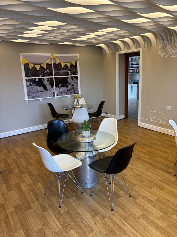 Image of a room with a table and chairs