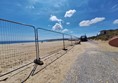 Image of a fence on a beach