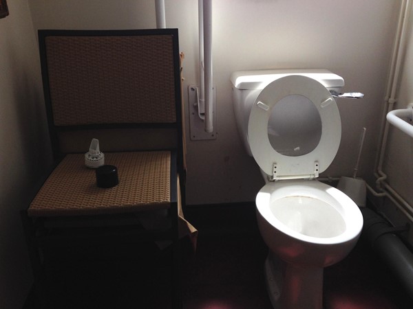 Picture of the Barley Mow - London  - An accessible toilet is NOT a store-room for spare furniture. This stack of 4 chairs next to the toilet made sideways wheelchair-to-toilet transfer impossible.