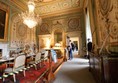 Inside the dining room with wide walkway and good lighting.