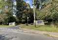 Image of a road with a sign on it