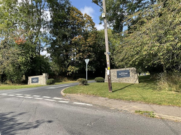 Image of a road with a sign on it