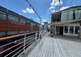 Looking out from the yacht toward the shopping centre and the old Debenhams building