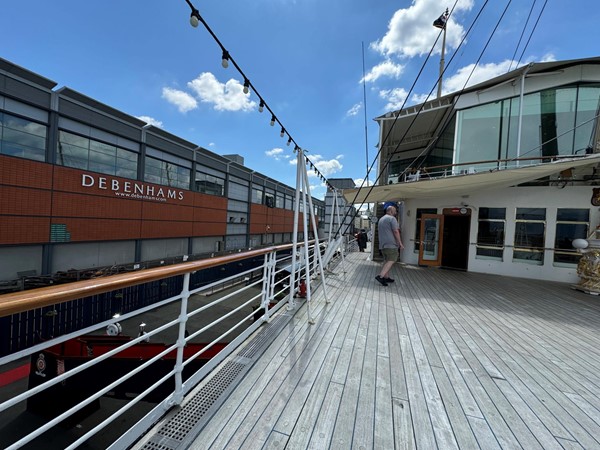 Looking out from the yacht toward the shopping centre and the old Debenhams building