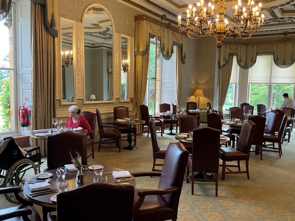 Image of a room with tables and chairs