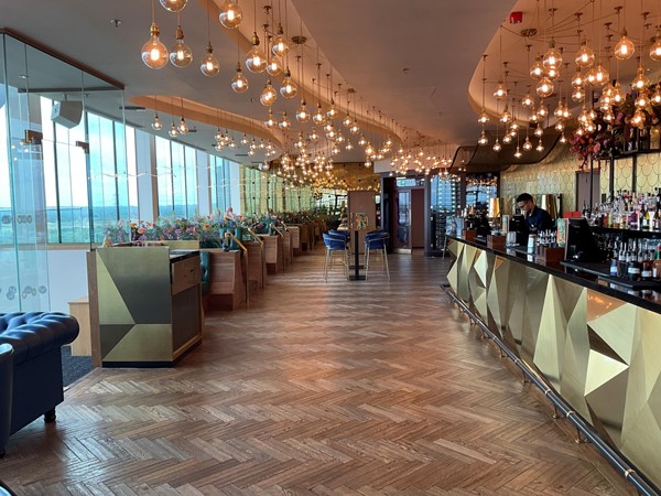 Take the lift from ground floor just by customers services up to fifth floor and enter the SKY BAR which is a very attractive and well spaced out area. There are seating places with a number of places a wheelchair can be placed.