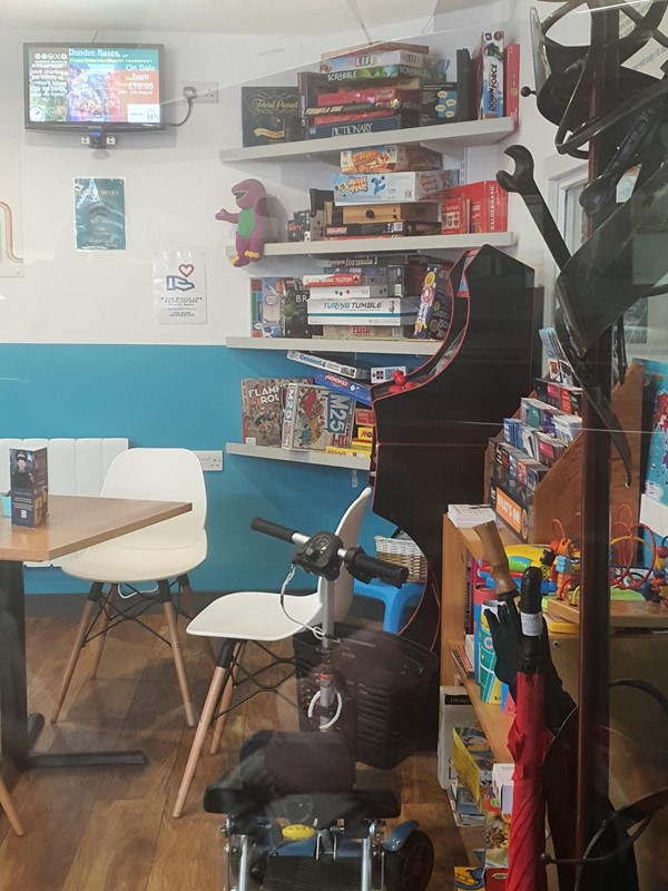 Image of lots of games available in the cafe.