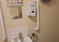 Image of a sink and a grab rail