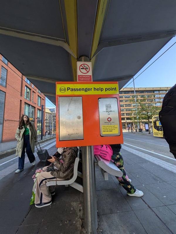 Image of the passenger help point and platform seating