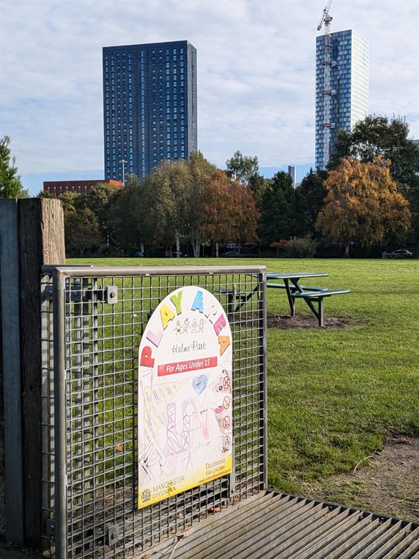 Image of grate at the entrance to the park