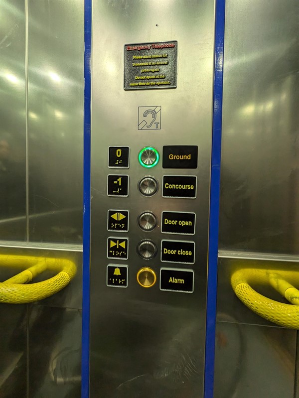 Image of lift access. The lift buttons have Braille Markings and an induction loop