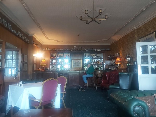 Image of a room with tables and chairs