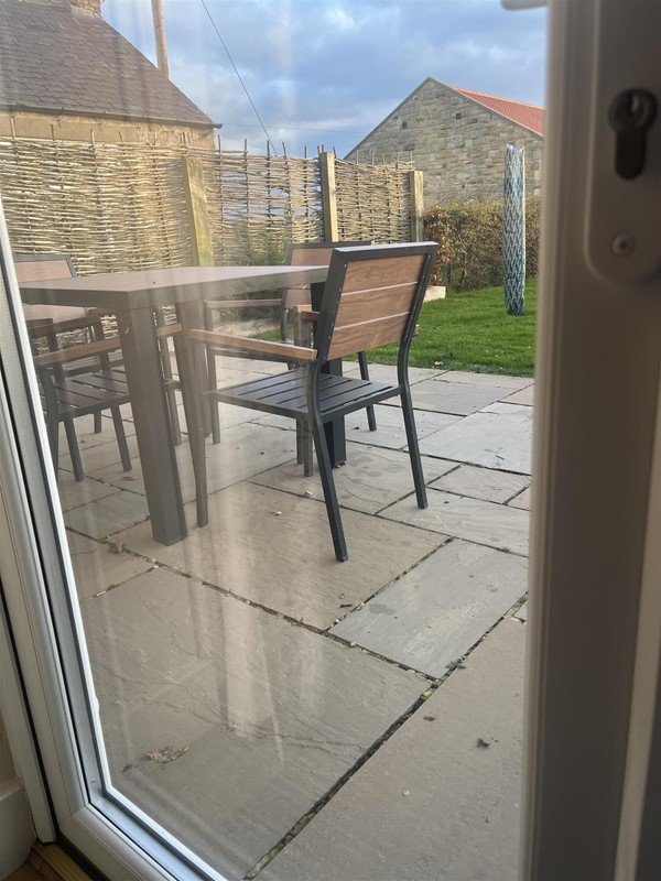 Image of a table outside a window