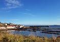 Picture of some buildings by the sea