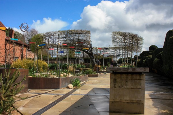 Garden entrance area with smooth paving.