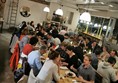 A group of people sitting at tables