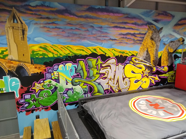 Crash pad with local landmarks in the graffiti decoration