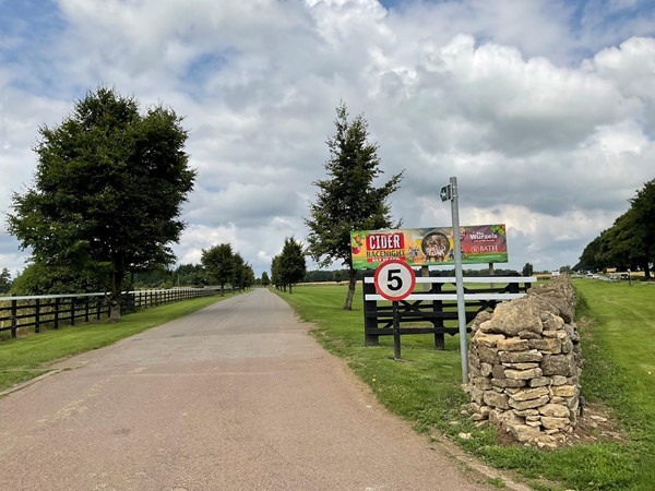 Image of a road with a sign on it