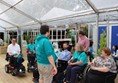 Paul, Euan and other Euan's Guide folks sitting in the gardens at the Edinburgh International Book Festival