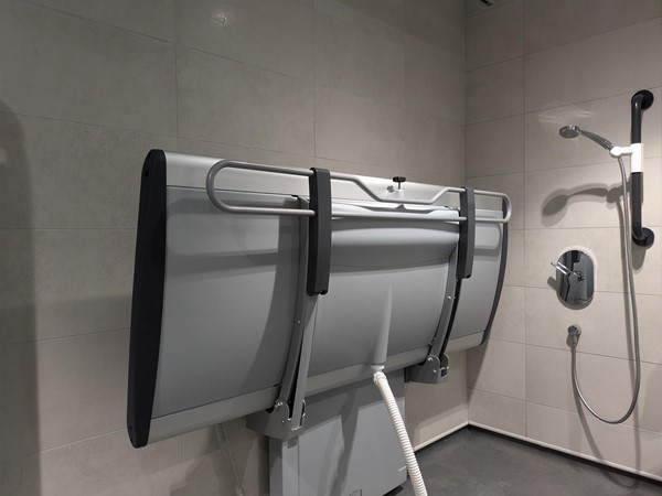 Image of Adjustable change bed in the Changing Places toilet