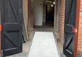 Image of a ramp going to a door