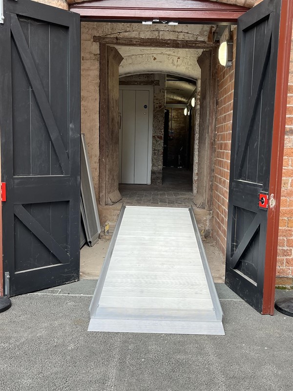 Image of a ramp going to a door