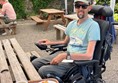 Powerchair user having lunch