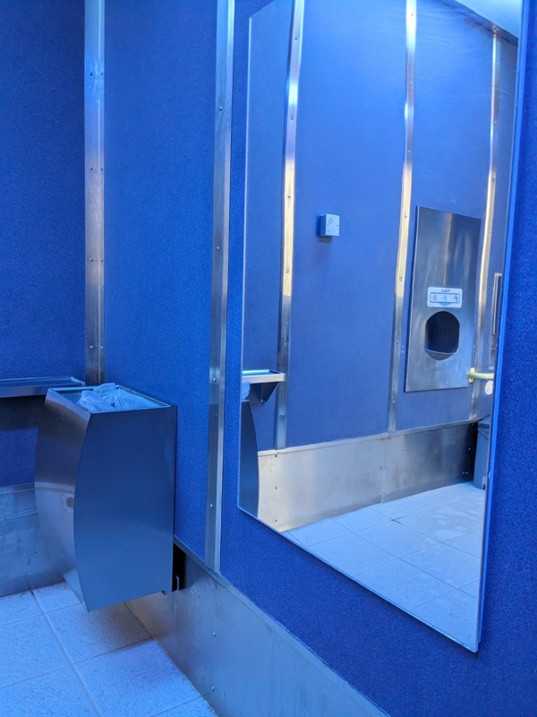 Another image of the unisex toilet.