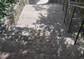 stone stairs with metal railings