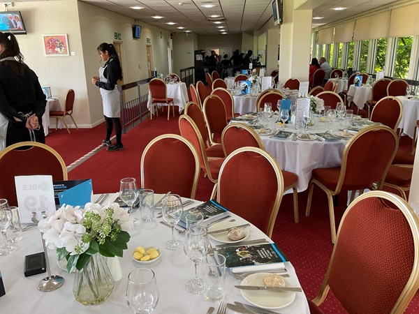 Image of tables in the hospitality area.