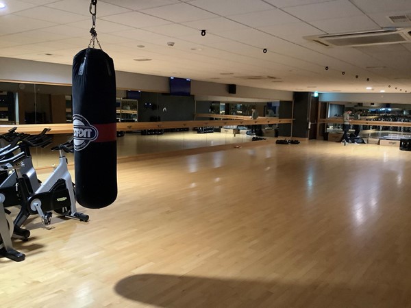 Picture of a gum area with a hanging punch bag