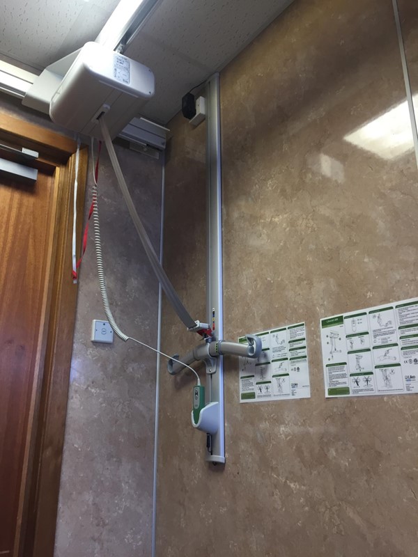 Hoist in disabled toilet