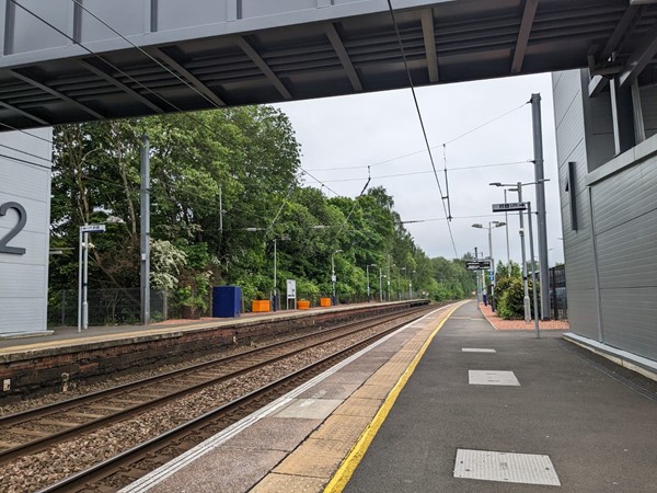 Image of train line at platform.