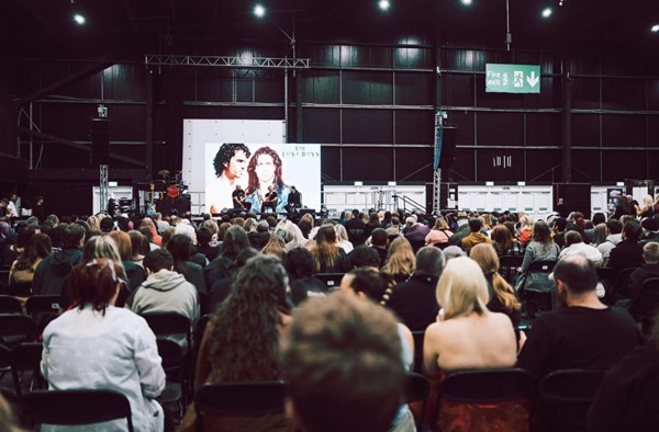 Image of a group of people sitting in a room