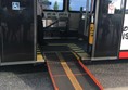 The electronic ramp on the bus.