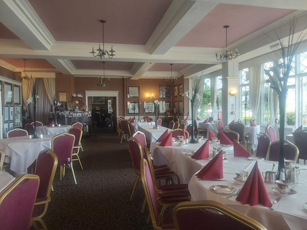 Image of a room with tables and chairs