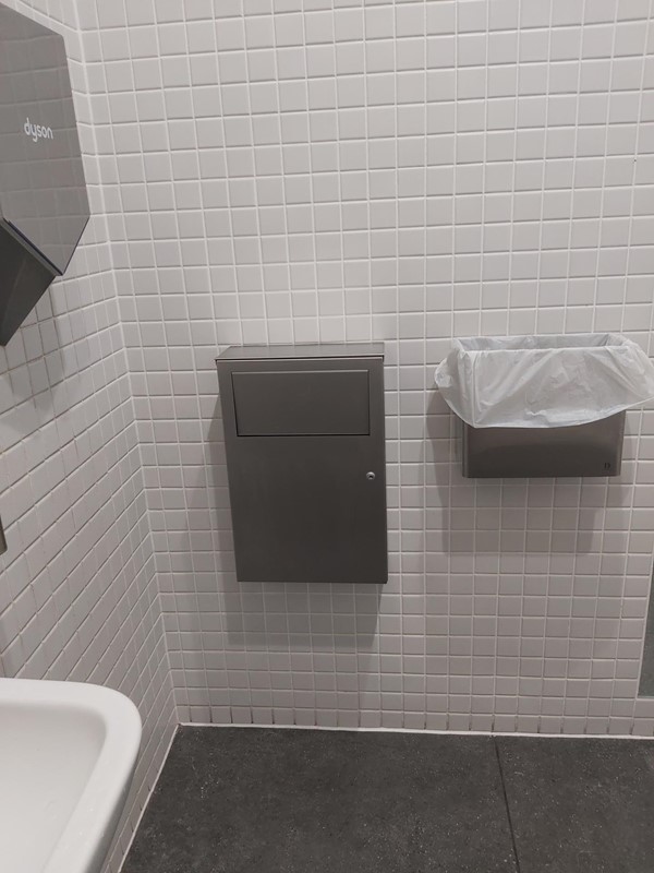 Image of a bathroom with a trash can