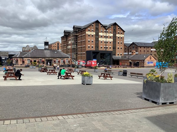 Picture of an outside area with picnic benches