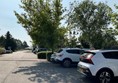 Image of a group of cars parked in a parking lot