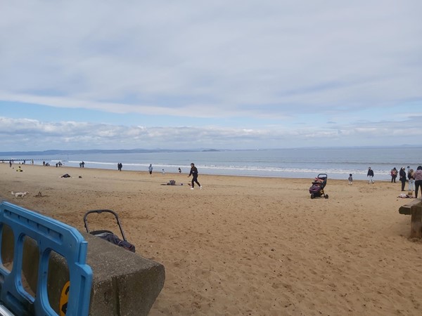 Image of a beach with people on it