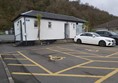 Image of the parking spaces beside the accessible toilet building.