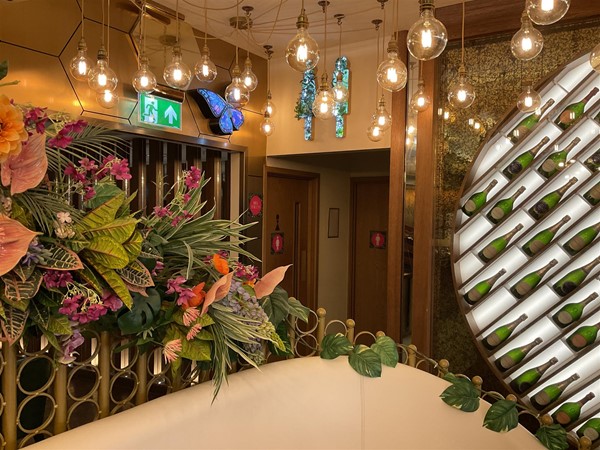 Image of flowers and bottles