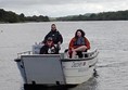 Coming back to shore. Front of the boat winds down onto slip so you do not need to come out of your wheelchair.