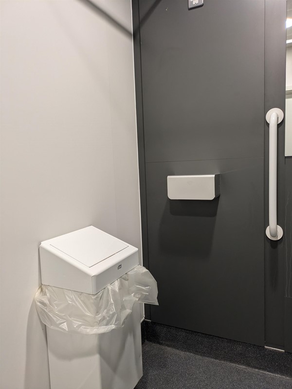 Image of accessible toilet - bin and hand dryer