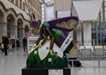 Image of a colourful bee statue in the railway station.