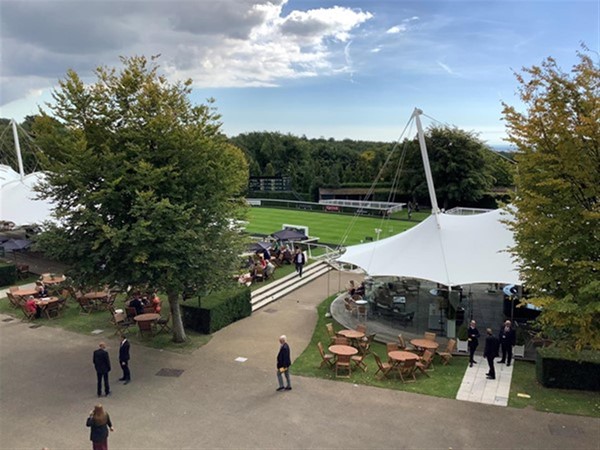 Image of a tent with outdoor seating