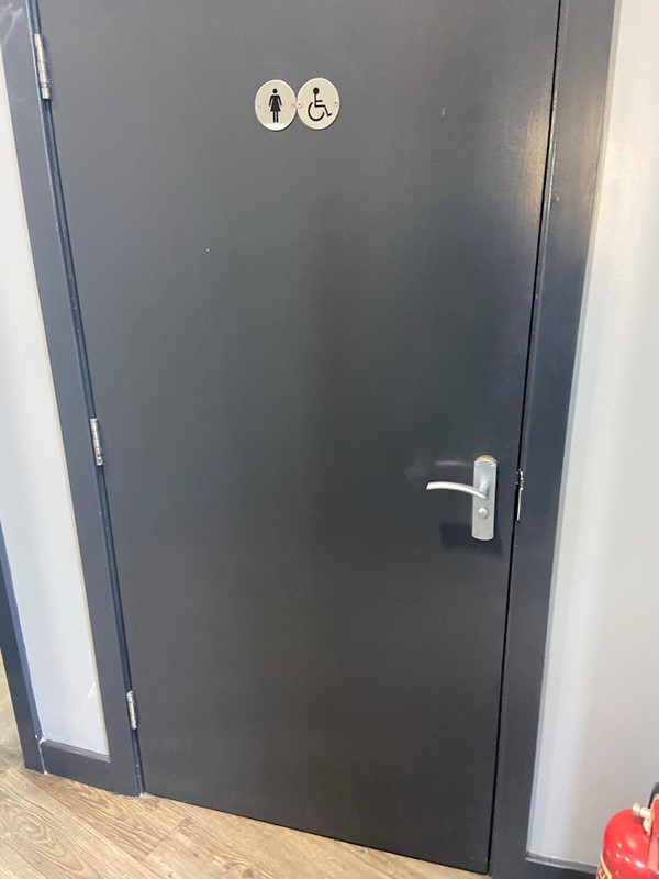 Picture of the accessible toilet door